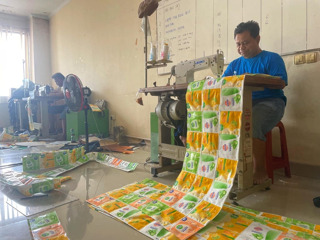 XSProjek tailoring activities are currently sewing custom orders using recycled plastic packaging materials.